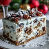 Creamy Christmas Cheesecake Slab with spiced dried fruits on a crunchy digestive biscuit crust. 