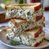 Kentucky Derby Benedictine tea sandwiches with cucumber and cream cheese on white bread.
